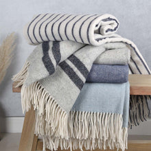 Load image into Gallery viewer, A collection of Australian Pure Wool Throws in shades of blue and grey