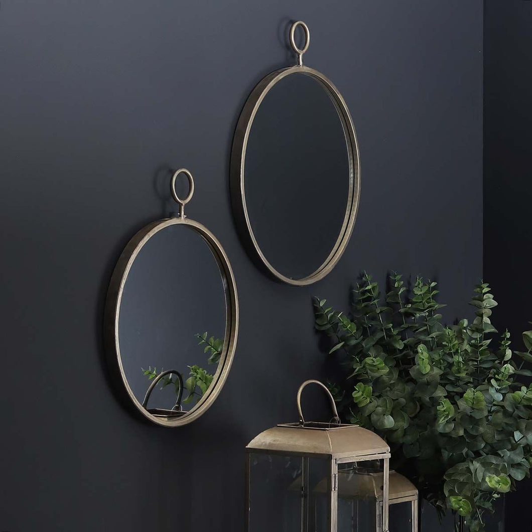 Round Metal Mirror with Decorative Loop At Top